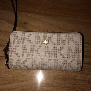 Michael Kors Wristlet/cell phone holder/wallet